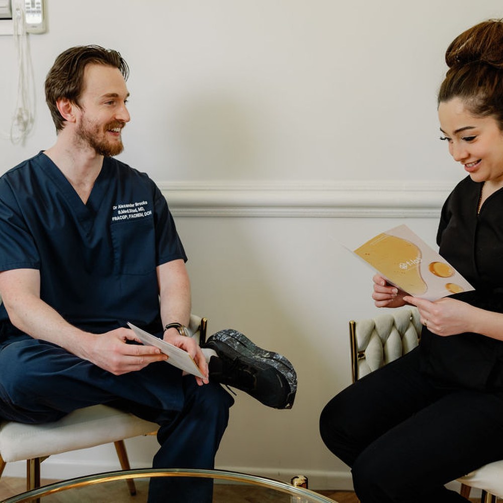 Dr Alex and Dr Ranadi during a consultation at 3D Hair Transplant, Gold Coast