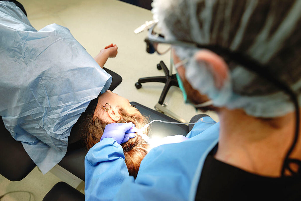 Doctor performing an FUE hair transplant procedure at the 3D Hair Transplant clinic